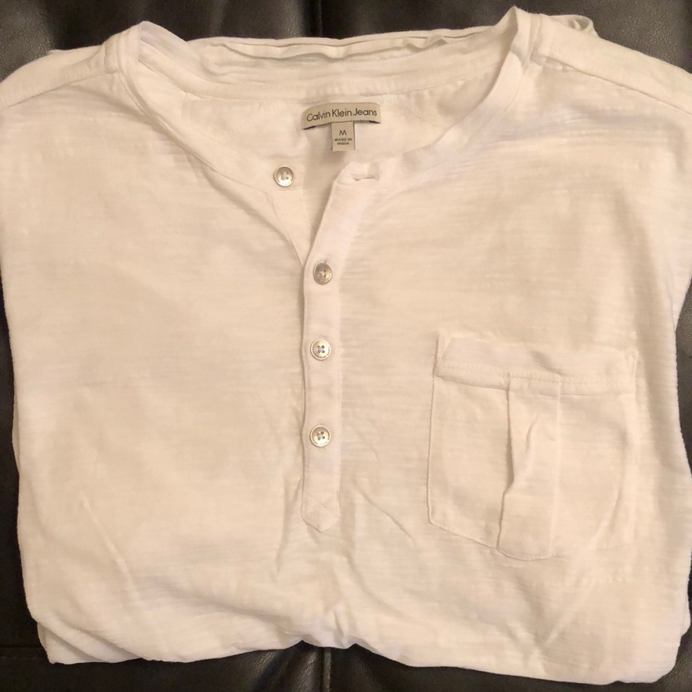 Calvin Klein white tee.